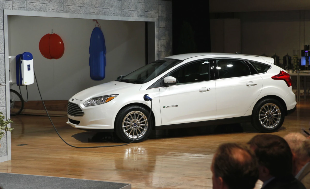 Ford Focus Electric is revealed for the first time in New York City, Friday, Jan. 7, 2011. The all new Ford Focus Electric is Ford's first all-electric passenger car and one of five new electrified vehicles Ford will deliver by 2012. (Photo/Stuart Ramson/Ford) (1/7/2011)