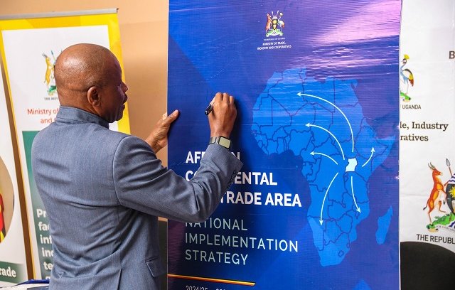 Gen-Mbadi-signs-on-Ugandas-AfCFTA-Implementation-Strategy