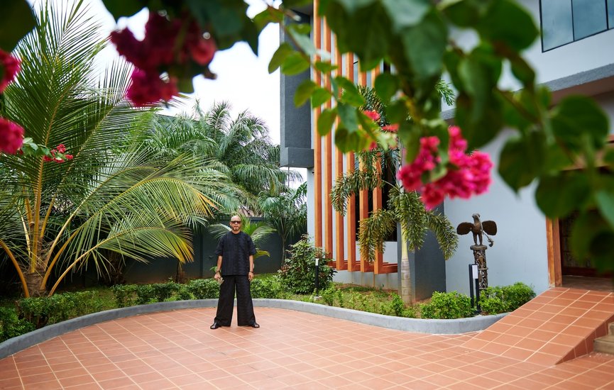 Portrait-of-Victor-Ehikhamenor-outside-Black-Muse-Residency-Benin-City-Nigeria-2025.-Image-Courtesy-of-Angels-Muse-and-artist-Victor-Ehikhamenor-1