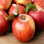 Apple Fruit in Sri Lanka; Dark Charcoal Red Sweetest Taste Soft Firm Texture