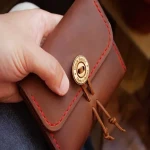 The price of leather wallets womens from production to consumption