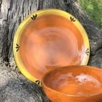 Learning to buy an orange clay plate from zero to one hundred