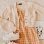 The price of bulk purchase of cream colored dress is cheap and reasonable