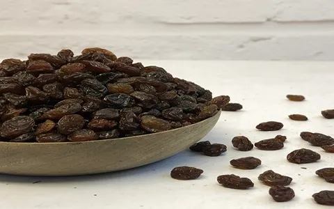 کشمش سیاه پلویی (مویز) درمان پوکی استخوان حاوی ویتامین Protein