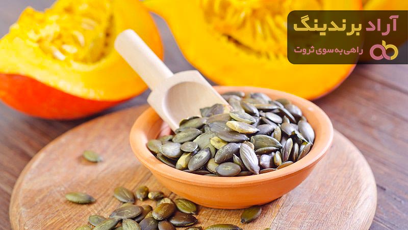 قیمت تخمه کدو دو آتیشه + مشخصات بسته بندی عمده و ارزان