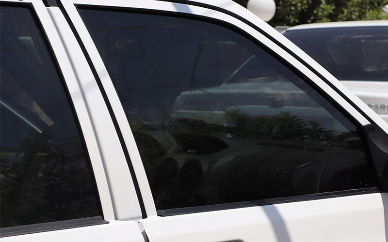 شیشه دودی 30 درصد smoked glass آبی طلایی نقره ای جهت ایمنی رانندگی