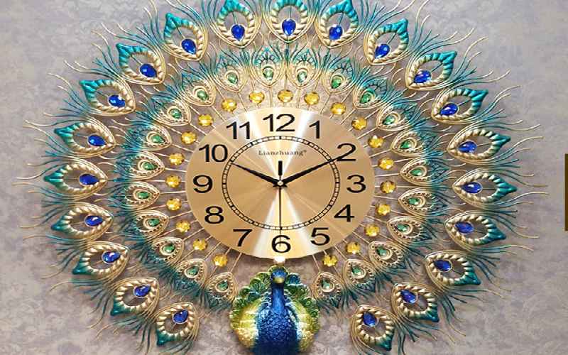 قیمت ساعت دیواری برنز طرح طاووس