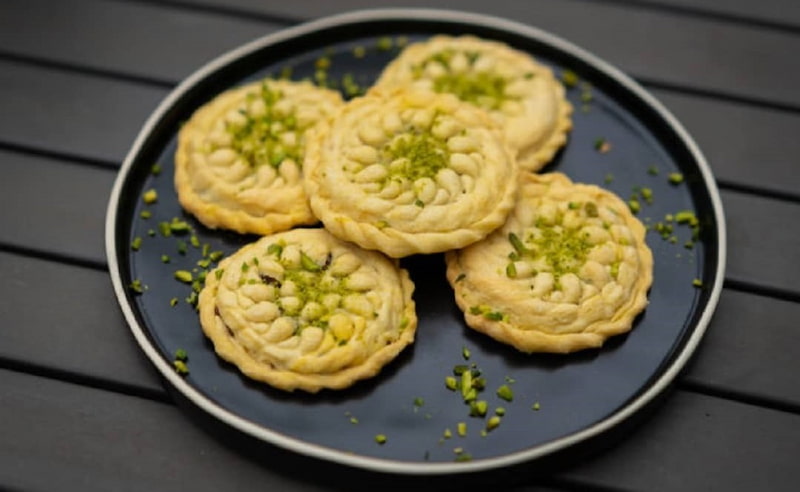 کلمپه کرمان (کلوچه) گردویی شکلاتی کنجدی زعفرانی برنجی پسته ای