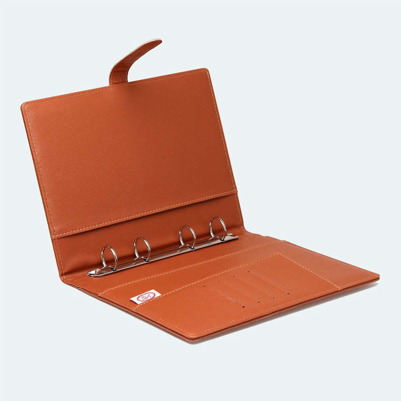 کلاسور جلد چرم؛ طبیعی مصنوعی بادوام قابل باز و بسته شدن