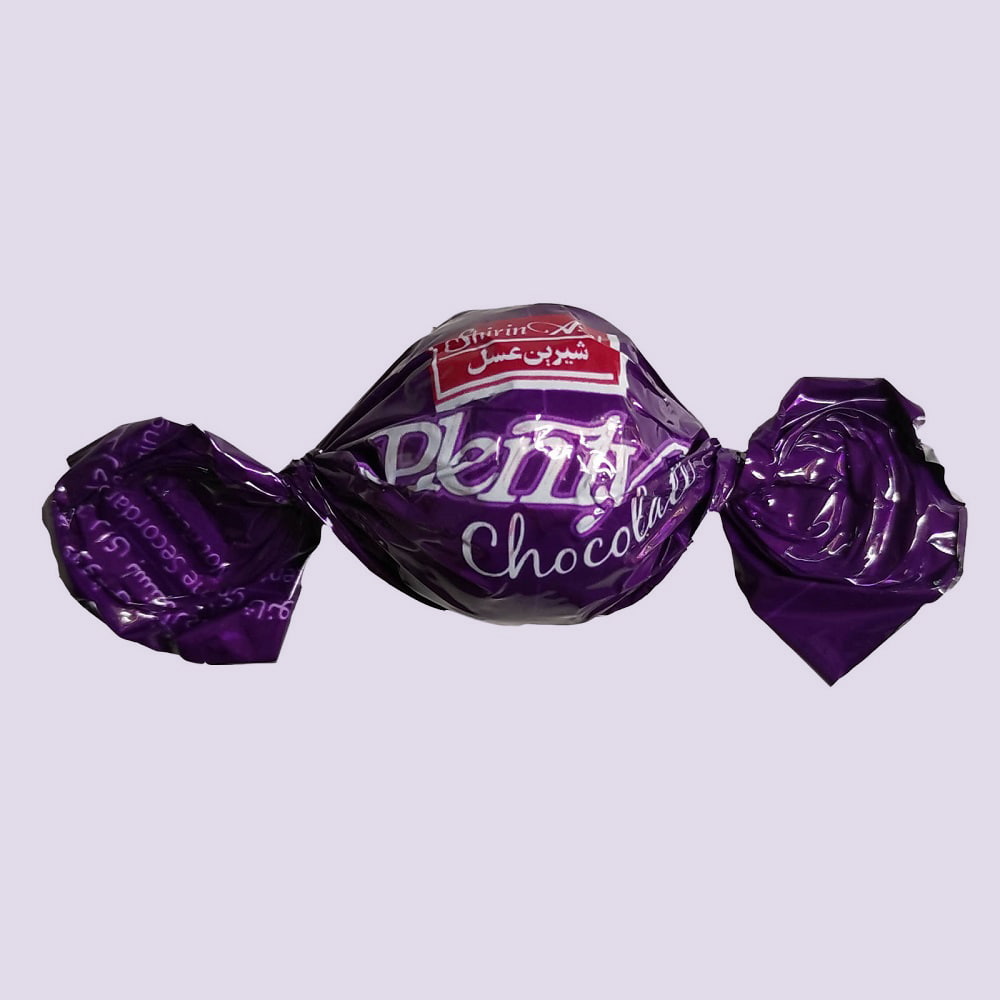 شکلات شیرین عسل توپی؛ طعم تلخ شیری فندقی رنگ سفید قهوه ای