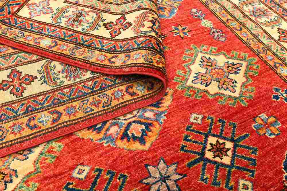 فرش نگین گلستان کاشان؛ رنگ قرمز ارغوانی سرمه ای (700 1200 1500) شانه