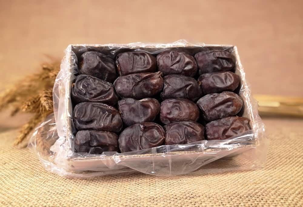 خرما مضافتی کیلویی؛ شیره غلیظ رنگ تیره آهن پتاسیم