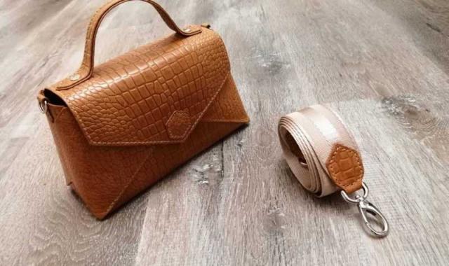 کیف چرم زنانه نوین چرم؛ قهوه ای مشکی مقاومت ماندگاری بالا