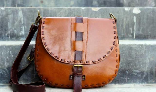 کیف چرم زنانه دست دوز؛ زیپی دکمه ای گاوی بزی گوسفندی