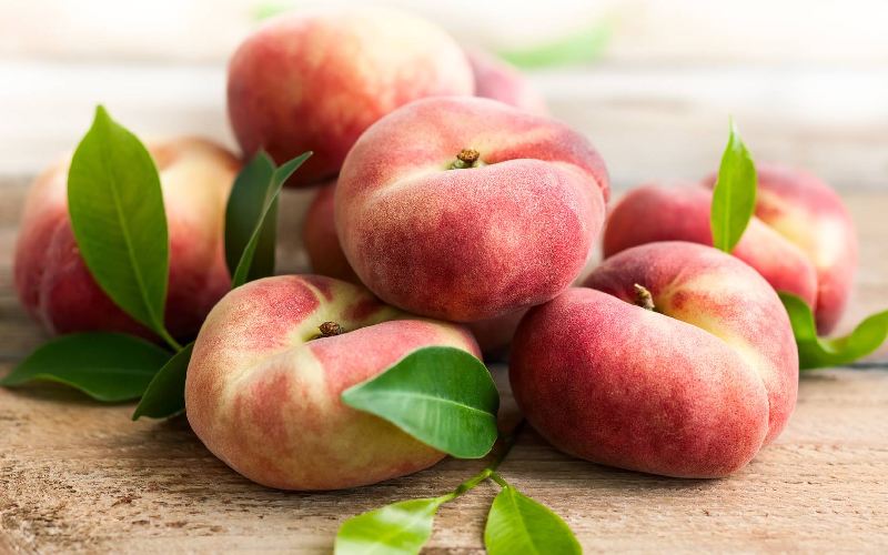 هلو بشقابی؛ قرمز زرد حاوی پروتئین ویتامین C درمان دیابت سرطان