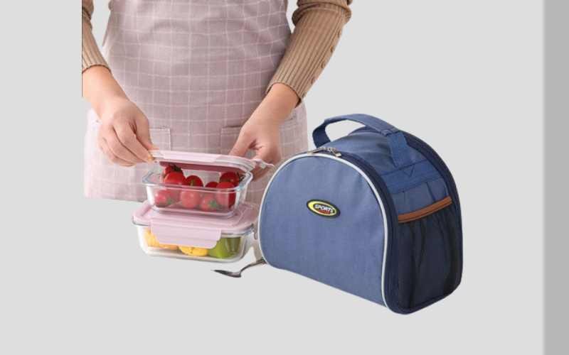 کیف غذا اداری؛ برزنتی چرم جادار زیپ دار 2 رنگ سیاه سرمه ای