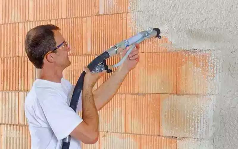 گچ پاششی (مصالح ساختمانی) سفید دارای ابزار مخصوص مناسب ساختمان