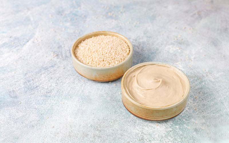 ارده عقاب؛ زرد رنگ ترکیب کنجد سفید گلوگز طعم عالی eagle flock