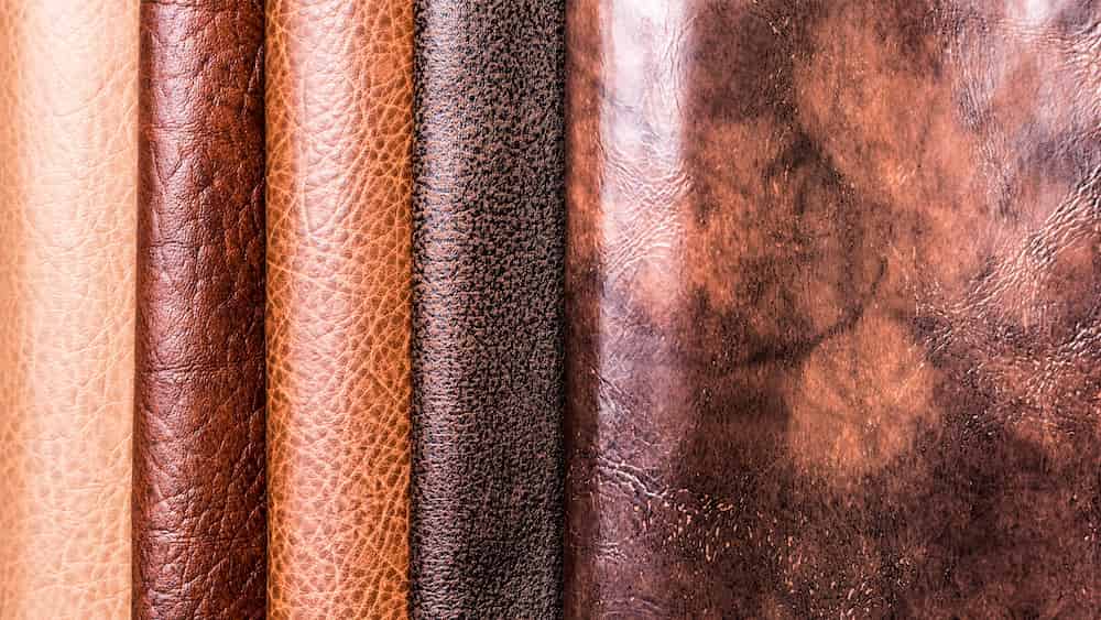 چرم مصنوعی کاغذی؛ قهوه ای مشکی جنس پارچه پی وی سی PU