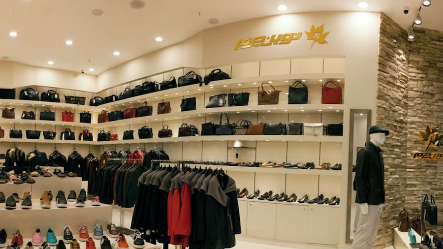 چرم نوین رشت؛ طبیعی جذب رطوبت (گاوی قهوه ای پوست ماری) کیف کفش