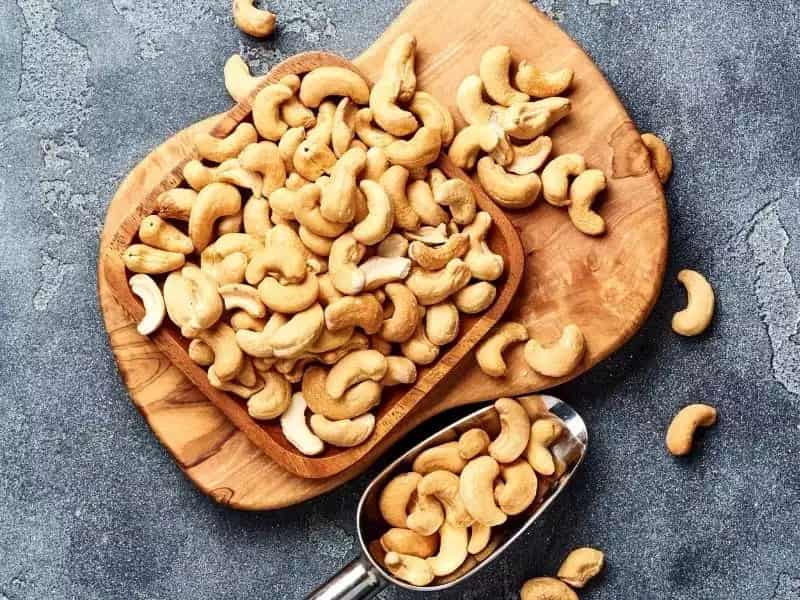 بادام هندی اصل (کاشو) خام بو داده 2 طعم نمکی زعفرانی