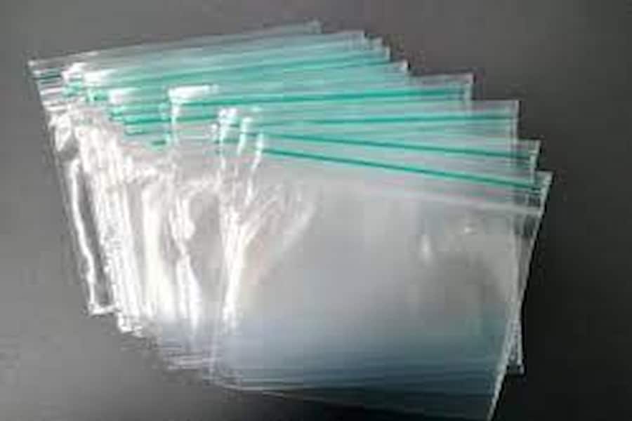 نایلون بسته بندی قند؛ دسته دار زیپی رولی 3 رنگ مشکی سفید زرد