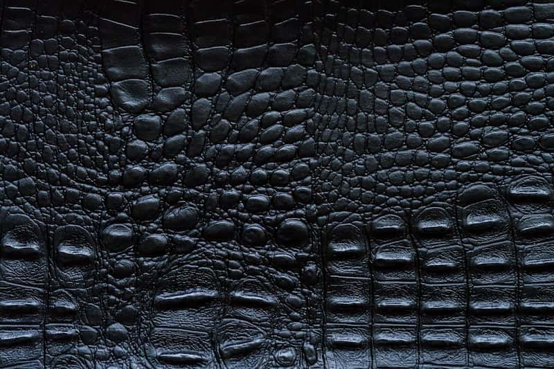 چرم پوست ماری مشکی؛ مصنوعی طبیعی براق 2 رنگ سفید آجری