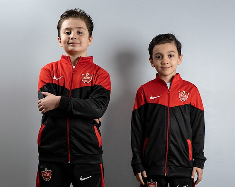 لباس ورزشی پرسپولیس بچه گانه؛ پلی استر نخ پنبه شامل (بازوبند عینک)