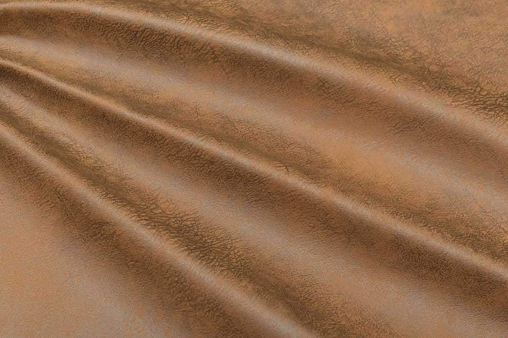 چرم نسکافه ای تیره؛ مات براق رنگ گیاهی تولید (زیره کفش کیف)