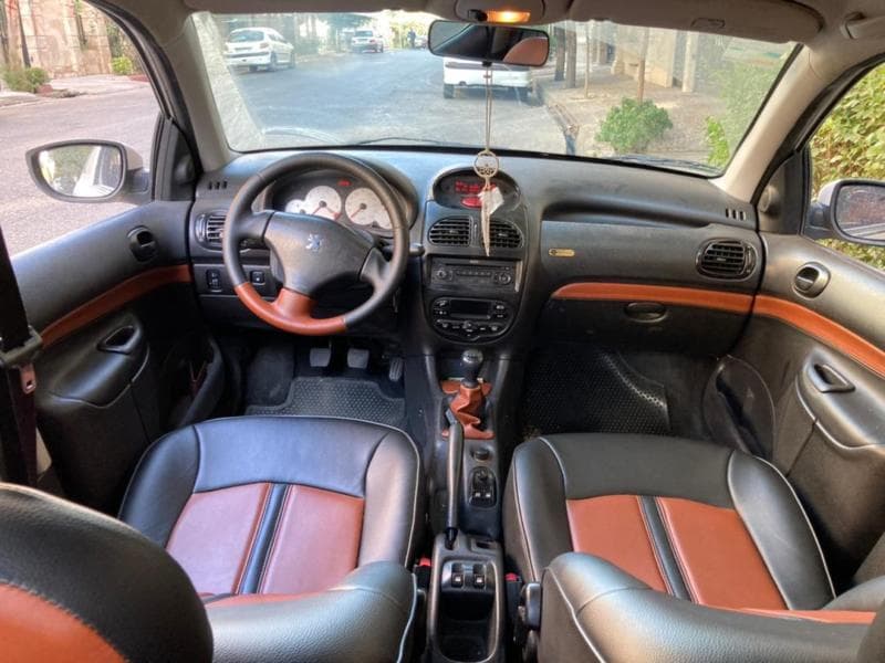 چرم دوزی فرمان 206؛ طبیعی مصنوعی 2 مدل طرح دار ساده ضد تعریق