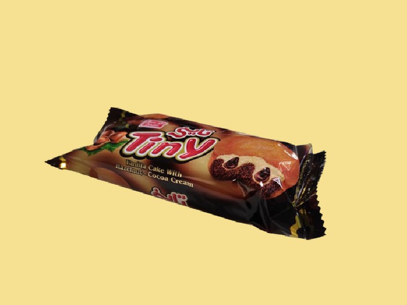 کیک تاینی عمده؛ مغز فندق روکش کاکائویی دو لایه پروتئین Tiny