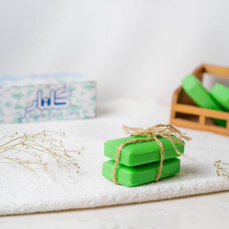 صابون گلنار درب کارخانه؛ قلیایی روغن نارگیل جلوگیری از pH پوست