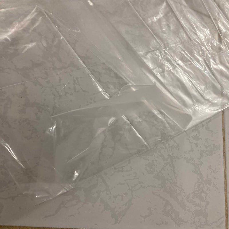 نایلون کوکی؛ رولی چسبدار سفید کرم شیرینگ پلاستیکی Iran