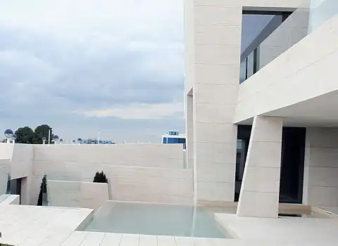 قیمت خرید عمده سنگ نما ساختمان سفید ارزان و مناسب