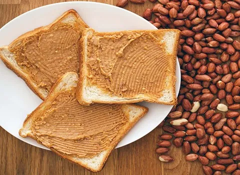 قیمت کره بادام زمینی طبیعی یک کیلویی و خواص آن برای بدن