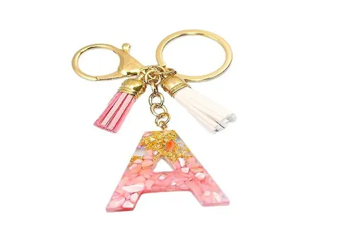 جاکلیدی دخترانه؛ اکسسوری عروسک روسی باب اسفنجی رنگین کمان دونات 2 رنگ صورتی بنفش