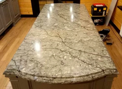 سنگ مرمریت جیرفت؛ میز مجسمه مشکی کرمی jirovt