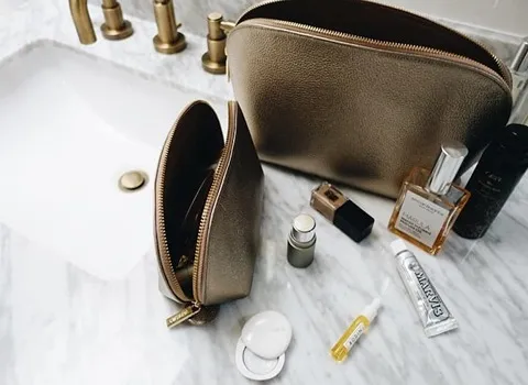 کیف آرایش چرم مشهد؛ صورتی سفید وزن (50 100) گرم