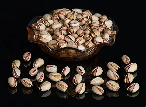 پسته احمد آقایی خام؛ بسته بندی فله (کیک شیرینی گز) پتاسیم کلسیم