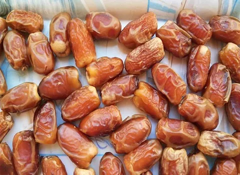 خرمای مضافتی خشک؛ خوشه ای پوست نازک بسته بندی 700 گرمی