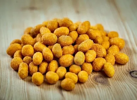 قیمت خرید بادام زمینی پفکی + خواص، معایب و مزایا