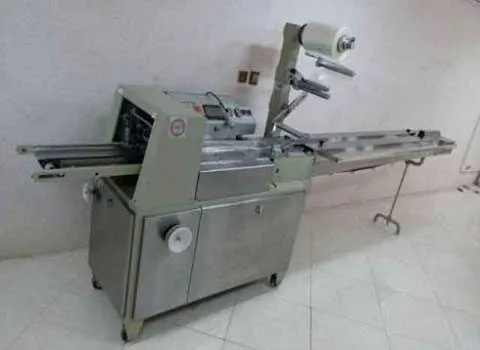 قیمت خرید دستگاه بسته بندی کیک + راهنمای استفاده