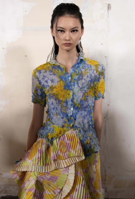 Colourful floral dress with pleated skirt