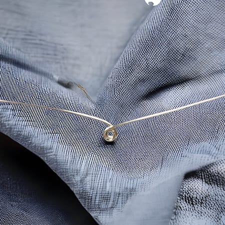 Create a loop in the center of your wire.