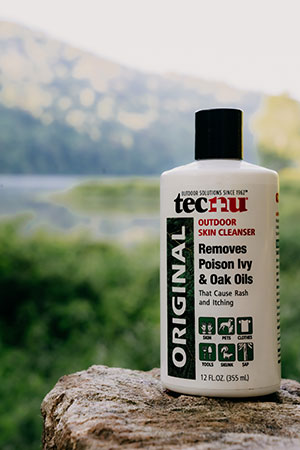 Tecnu Original Outdoor Skin Cleanser sitting on cliff edge