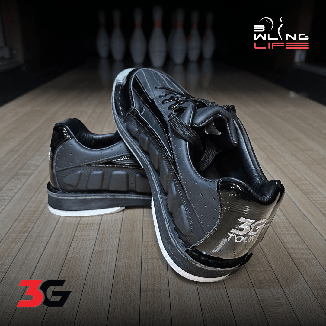 3G Tour Black bowling shoes on a bowling lane – premium leather bowling shoes with interchangeable soles, reviewed for performance and durability.