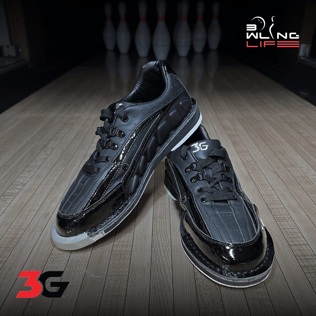 3G Tour Black bowling shoes on a bowling lane – premium leather bowling shoes with interchangeable soles, reviewed for performance and durability.