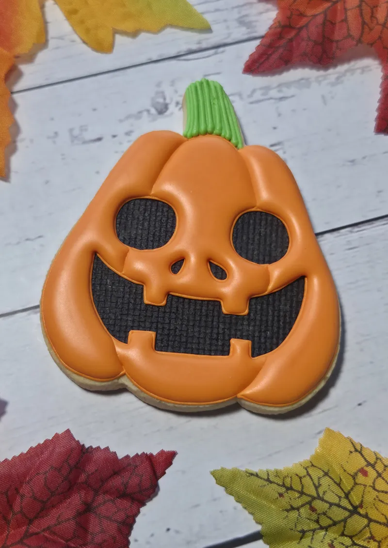 Spooky Grin decorated cookie