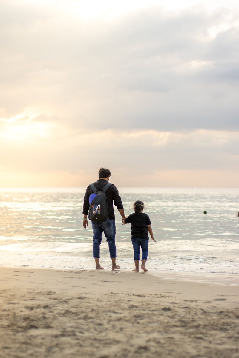 Father with Daughter on Beach · Free Stock Photo