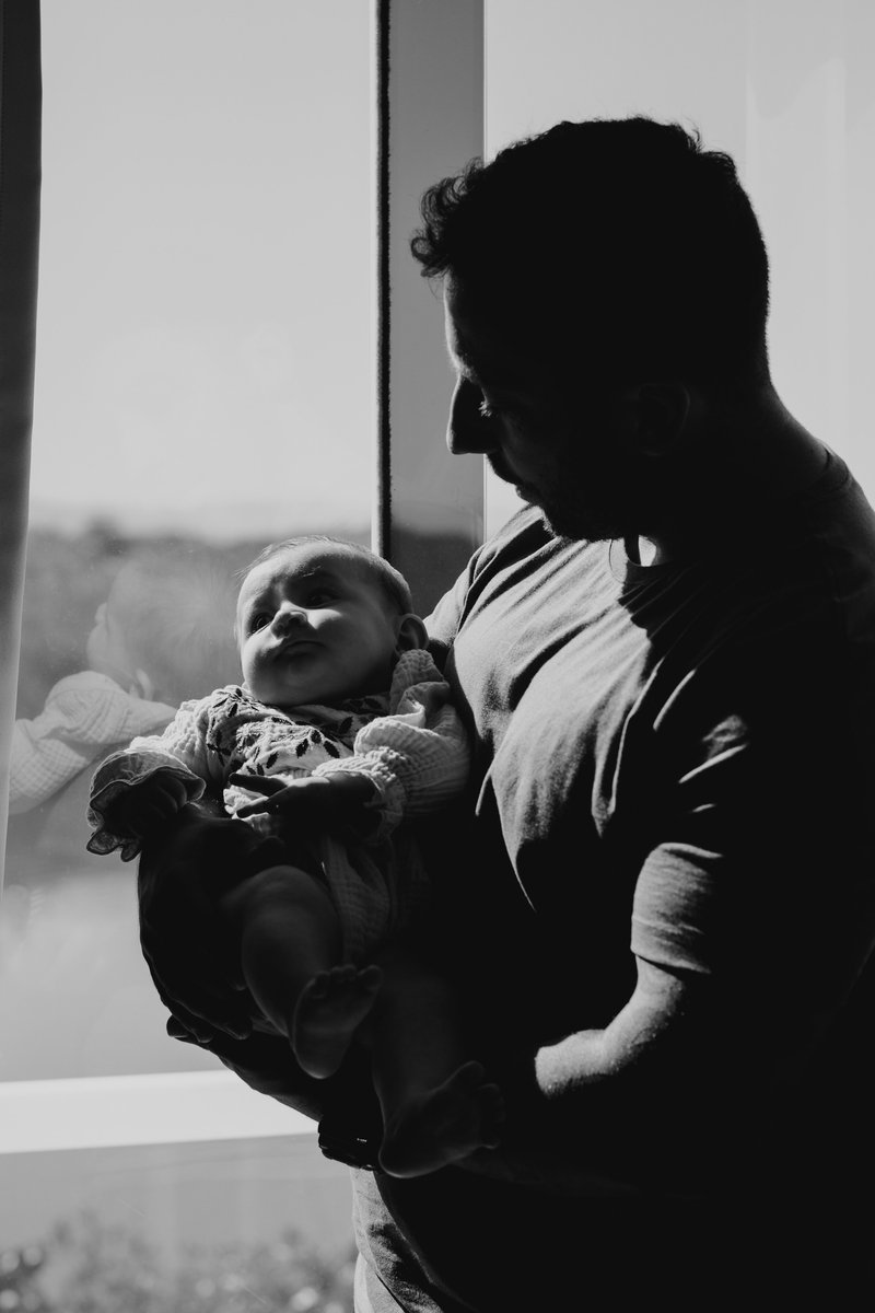 Father Holding His Little Baby · Free Stock Photo